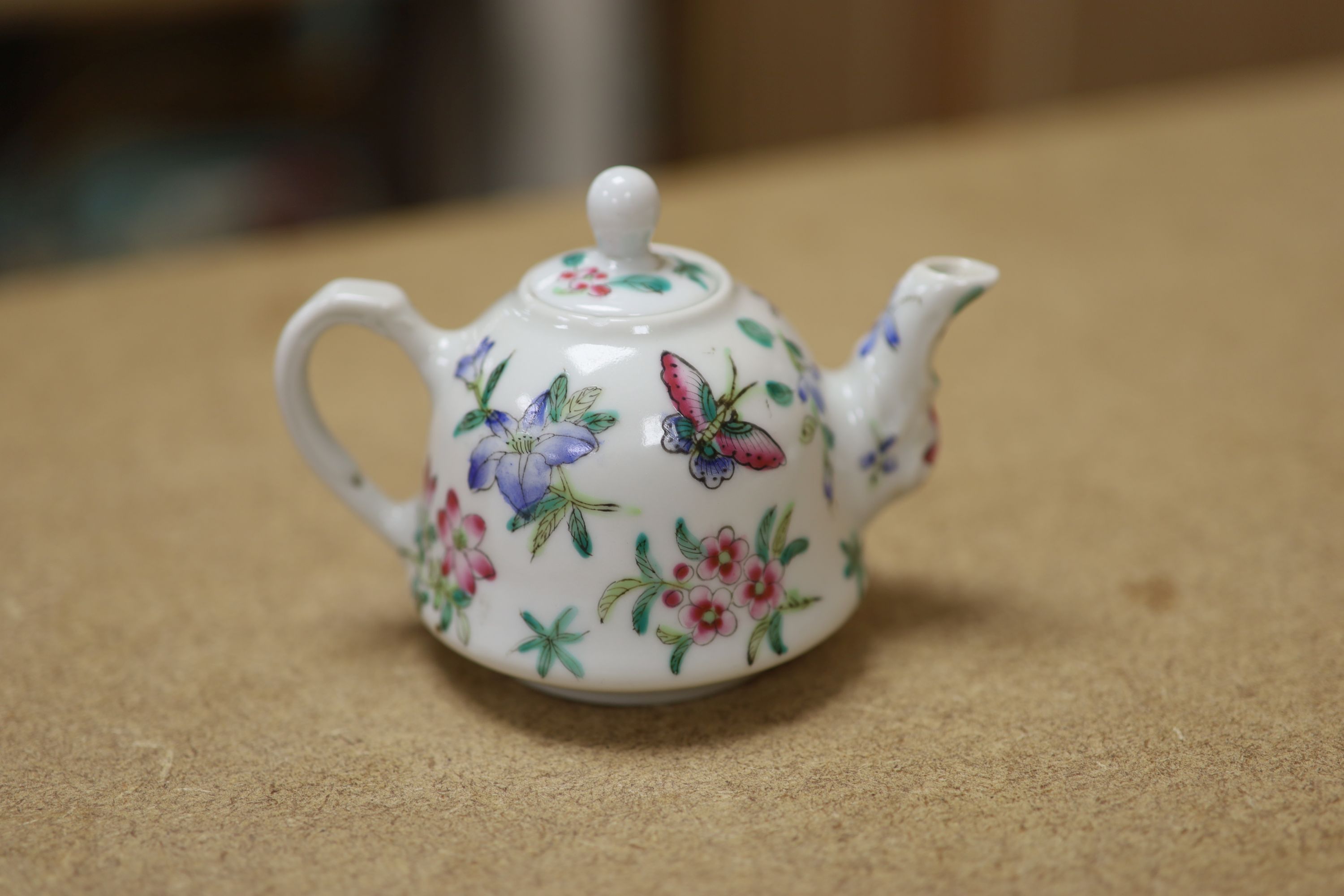 A Chinese Famille Rose miniature tea set with tray, length 18cm